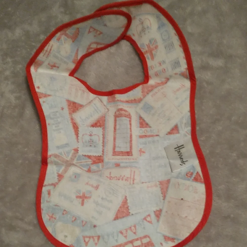 Harrods Red, Blue and White Vinyl Baby Bib with London Postcard Print